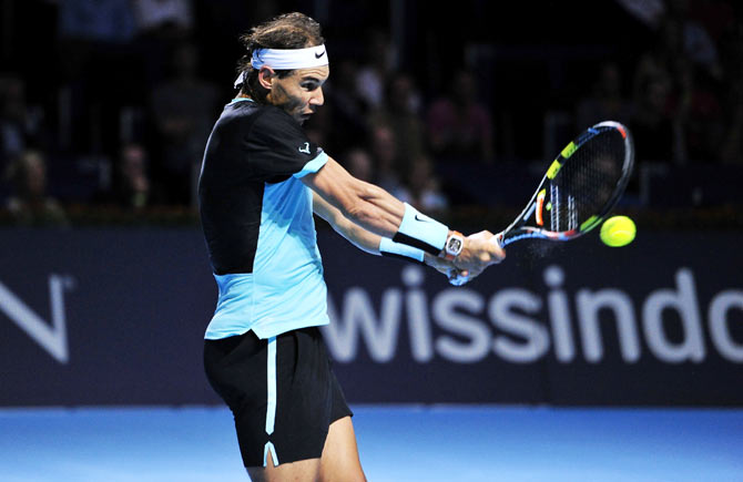 Spain's Rafael Nadal in action during the second day of the Swiss Indoors ATP 500 tennis tournament against Bulgaria's Grigor Dimitrov at St Jakobshalle in Basel on Wednesday