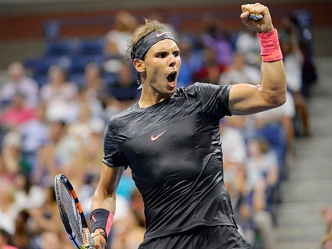 Spain's Rafael Nadal celebrates after winning a point to set up match point against Croatia's Borna Coric in their opening round match of the US Open on Monday