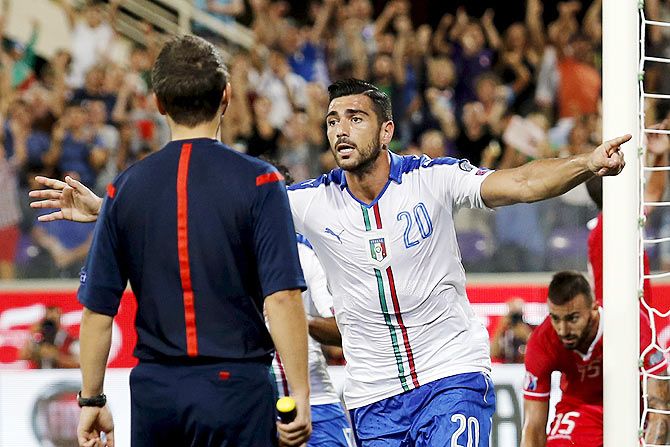 Italy's Graziano Pelle (centre) celebrates after scoring against Malta at the Franchi stadium in Florence, Italy