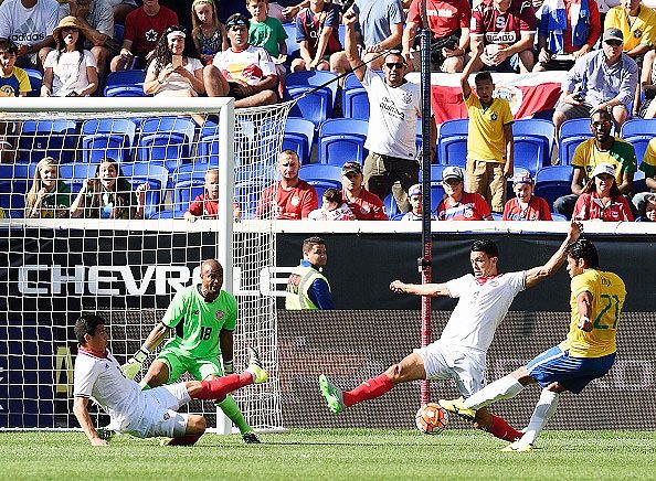 Brazil's Hulk (right) shoots to score against Costa Rica during a friendly at Red Bulls Arena in Harrison, New Jersey, on Saturday