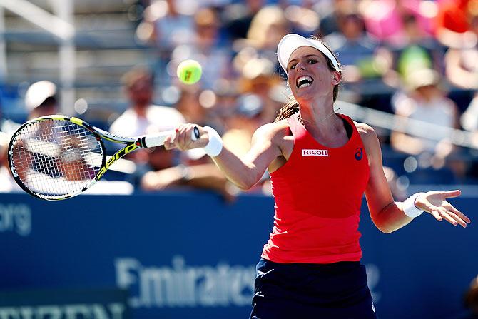 Great Britain's Johanna Konta retruns a shot against Germany's Andrea Petkovic