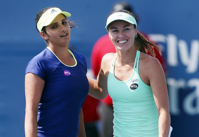 India's Sania Mirza and Switzerland's Martina Hingis