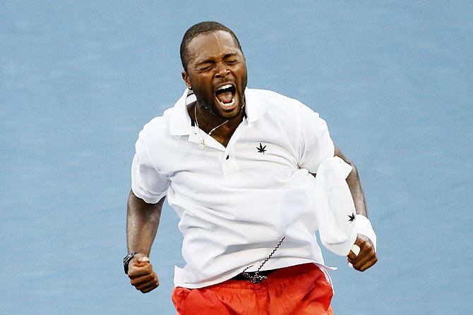 USA's Donald Young celebrates after defeating Serbia's Viktor Troicki