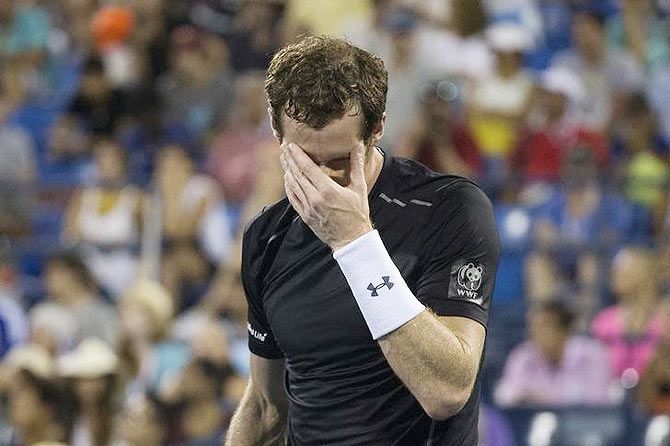 Britain's Andy Murray reacts after losing a point against South Africa's Kevin Anderson