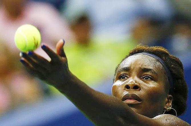 Venus Williams prepares to serve