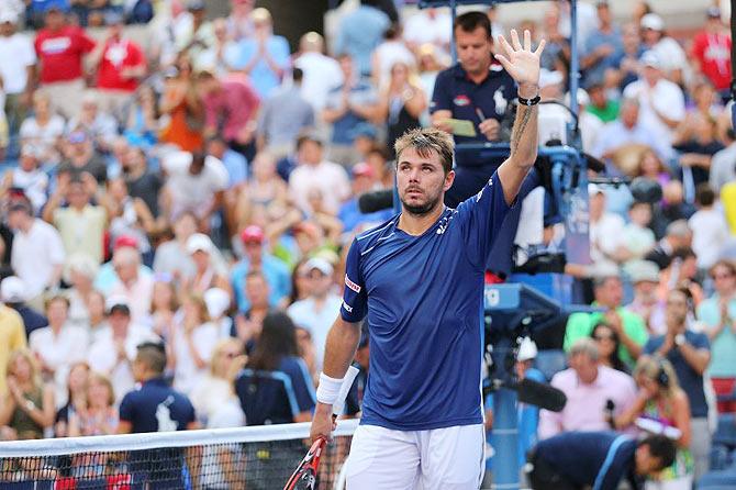 Switzerland's Stanislas Wawrinka celebrates his win against USA's Donald Young