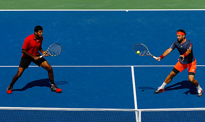Rohan Bopanna of India and Florin Mergea of Romania in action at the US Open 