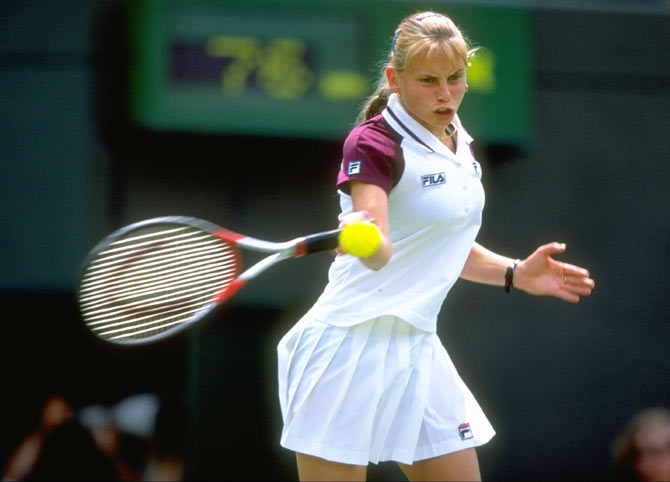 Australia's Jelena Dokic on her way to a shock win over the number one seed Martina Hingis during the first round match of the Wimbledon Championships played at the All England Club in London in 1999