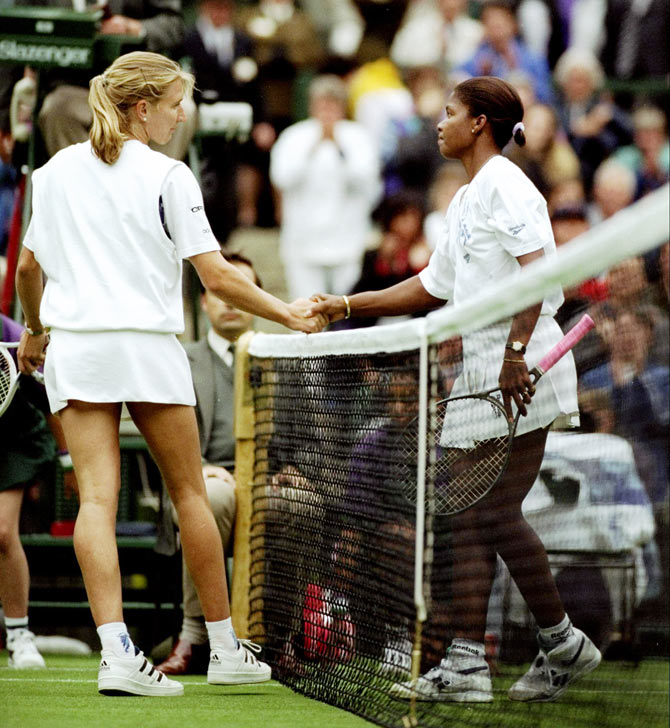 Germany's Steffi Graf shakes hands with USA's Lori McNeil after their match during the Wimbledon Championships held at the All England Club in 1994