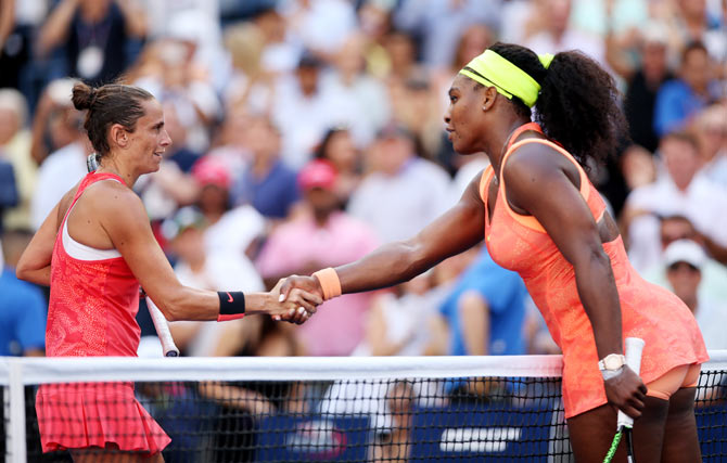 Italy's Roberta Vinci is congratulated by USA's Serena Williams after their semi-finals of the 2015 US Open at the USTA Billie Jean King National Tennis Center at the Flushing Meadows on Friday