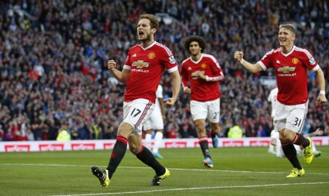 Daley Blind scores the opening goal for Manchester United in the English Premier League match against Liverpool on Saturday