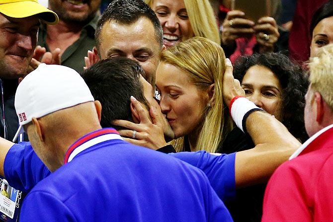 Novak Djokovic celebrates with his wife Jelena Djokovic