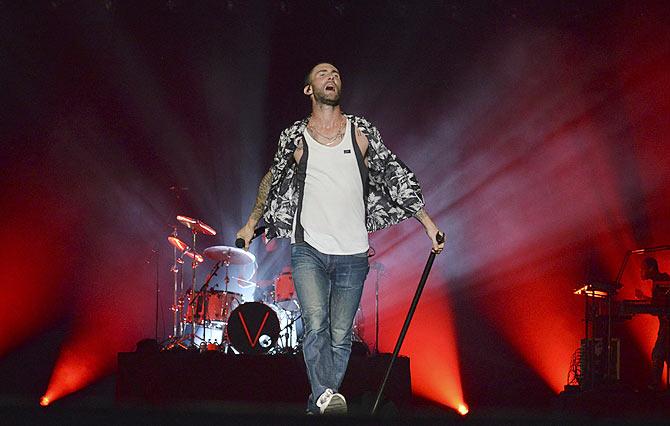 Maroon 5's frontman Adam Levine performs at the Marina Bay street Circuit in Singapore on Saturday