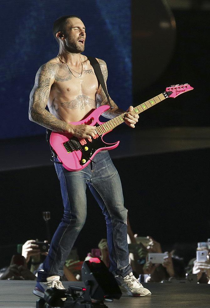 Adam Levine goes shirtless