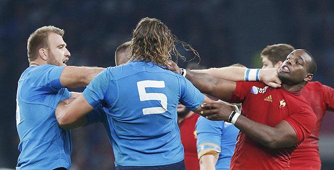 France's Eddy Ben Arous clashes with Italy's Lorenzo Cittadini during their IRB Rugby World Cup Pool D match in Twickenham Stadium, London, on Saturday