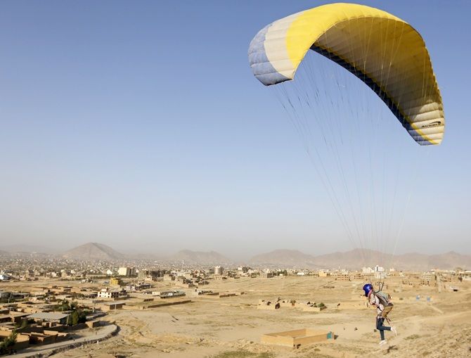 Afghan paraglider Zakia Mohammadi, 21, flies