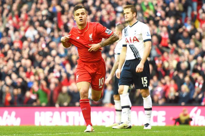 Liverpool's Philippe Coutinho celebrates scoring against Tottenham during their Barclays Premier League match at Anfield in Liverpool on Sunday