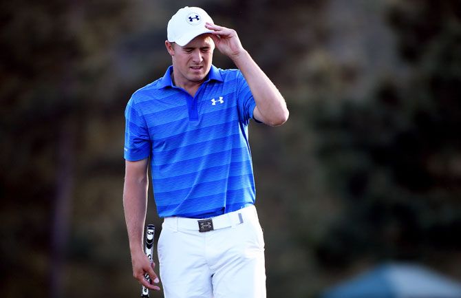 USA's Jordan Spieth reacts after finishing on the 18th green during the final round of the Augusta Masters