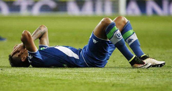 Wolfsburg's Luiz Gustavo is dejected at the end of their Champions League game against Real Madrid on Tuesday