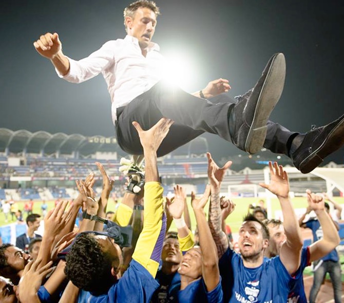 Bengaluru FC players celebrate with coach Ashley Westwood