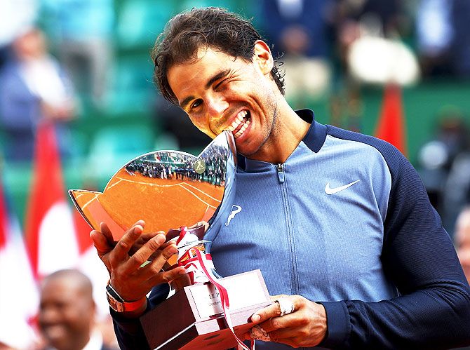 Spain's Rafael Nadal with his trophy after winning his beating France's Gael Monfils to win the Monte Carlo Masters title on Sunday