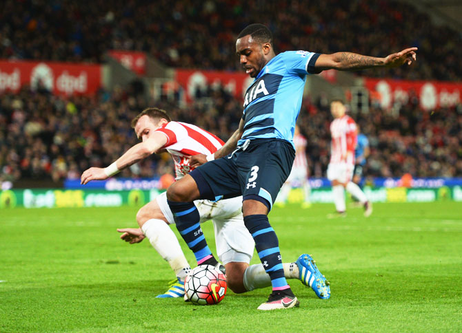 Tottenham Hotspur's Danny Rose is challenged by Stoke City's Glenn Whelan