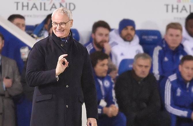 Claudio Ranieri, manager of Leicester City, reacts as former Chelsea manager Jose Mourinho looks on during their Barclays Premier League match at the King Power Stadium on December 14, 2015, in Leicester, United Kingdom