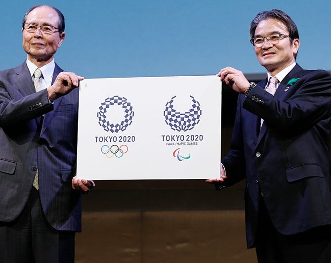  The winning emblem designs for Tokyo 2020, left, and Tokyo 2020 Paralympic Games is unveiled on in Tokyo, Japan