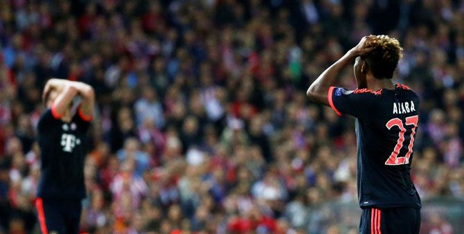 Bayern Munich's dejected David Alaba reacts