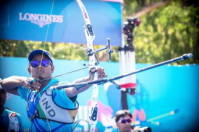 Atanu Das of India shoots during the men's recurve bronze final