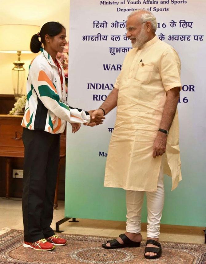 Prime Minister Narendra Modi wishes Sudha Singh at the send-off ceremony organised for the Indian contingent for Rio Olympics 2016 on July 4