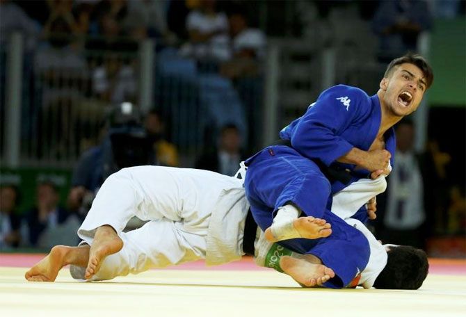 Baul An (KOR) of Korea and Fabio Basile (ITA) of Italy compete in the 66kg Judo final on Sunday