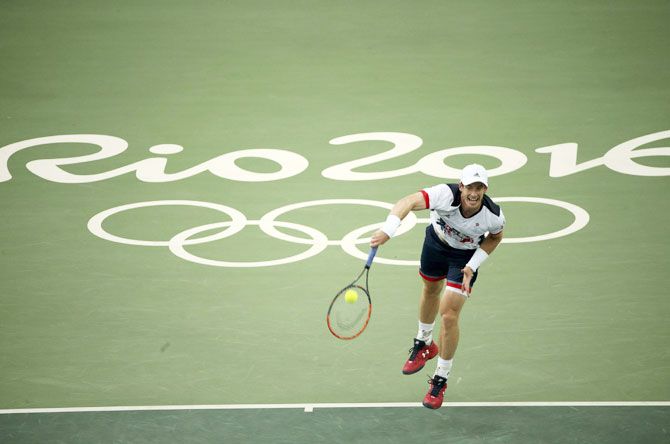 Great Britain's Andy Murray in action against Serbia's Viktor Troicki during their men's singles first round match at the Rio 2016 Summer Olympics on Sunday