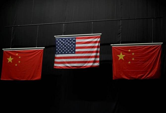 he American flag flies above the Chinese flags 