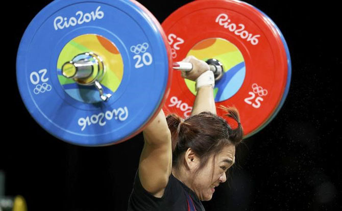 Thailand's Sukanya Srisurat competes in the Women's 58kg weightlifting final on Monday