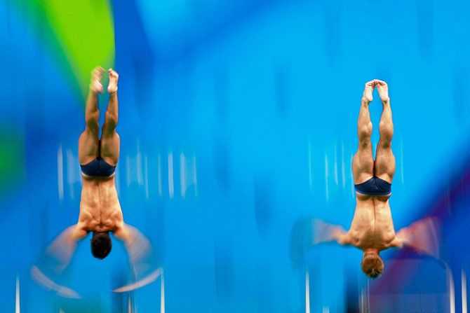 Jack Laugher and Chris Mears of Great Britain compete in the Men's Diving Synchronised 3m Springboard Final on Wednesday