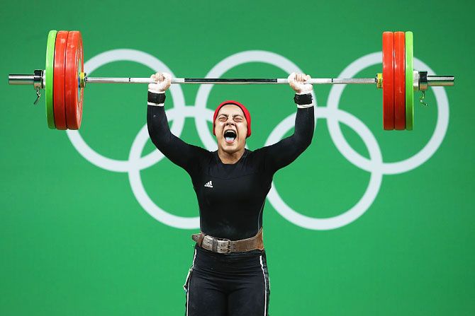Sara Ahmed of Egypt lifts during the Women's 69kg Group A weightlifting contest on Day 5 of the Rio 2016 Olympic Games at Riocentro, Pavilion 2 in Rio de Janeiro on Wednesday