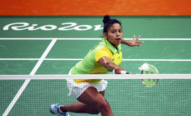 Brazil's Lohaynny Vicente plays a return against India's Saina Nehwal