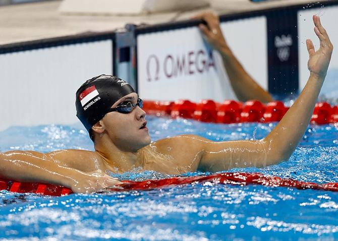 Joseph Schooling of Singapore celebrates winning gold in the Men's 100m Butterfly Final on Day 7 of the Rio 2016 Olympic Games