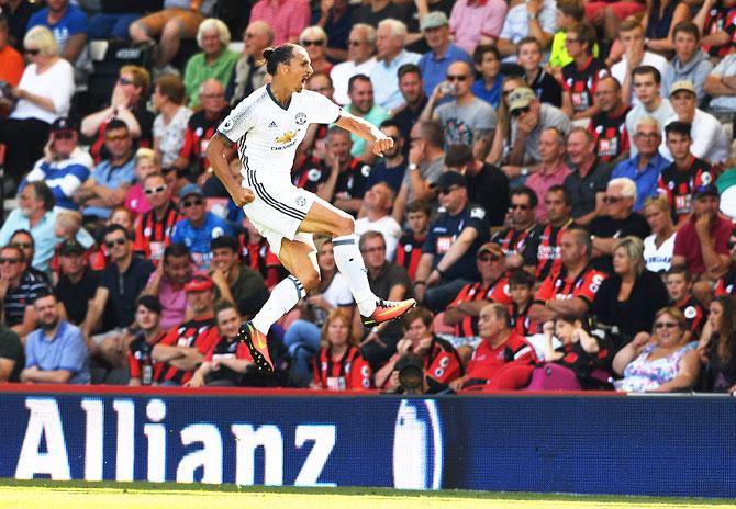 Manchester United's Zlatan Ibrahimovic celebrates scoring his team's third goal during their Premier League match against AFC Bournemouth at Vitality Stadium in Bournemouth on Sunday