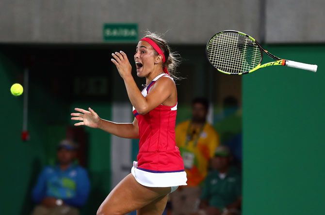Puerto Rico’s Monica Puig celebrates after winning the women's Singles Gold Medal Match at the Rio 2016 Olympic Games on August 14