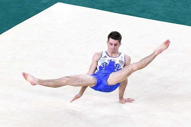 Max Whitlock of Great Britain competes in the Men's Floor Exercise Final on Sunday