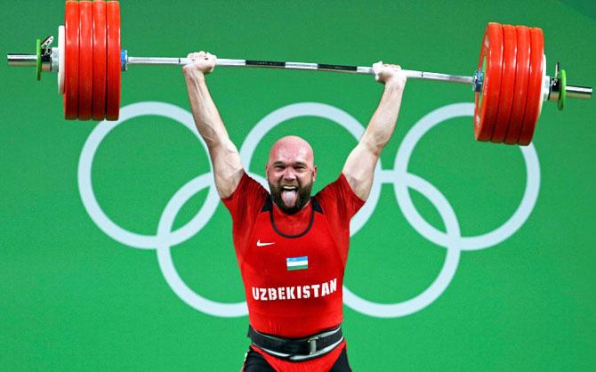 Ruslan Nurudinov of Uzbekistan competes in the Men's 105kg wrestling final on Monday