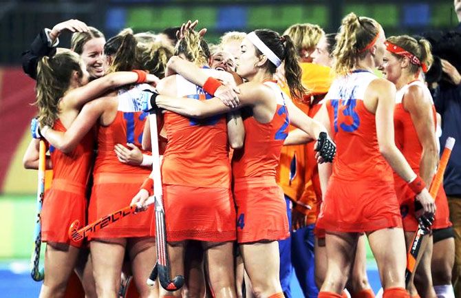 Netherlands women's hockey team celebrate their quarter-final win over Argentina at the Rio Olympics on Monday