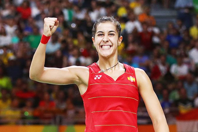 Carolina Marin of Spain celebrates a point against PV Sindhu of India during the Women's Singles Gold Medal Match at the Rio 2016 Olympic Games at Riocentro in Rio de Janeiro on Friday