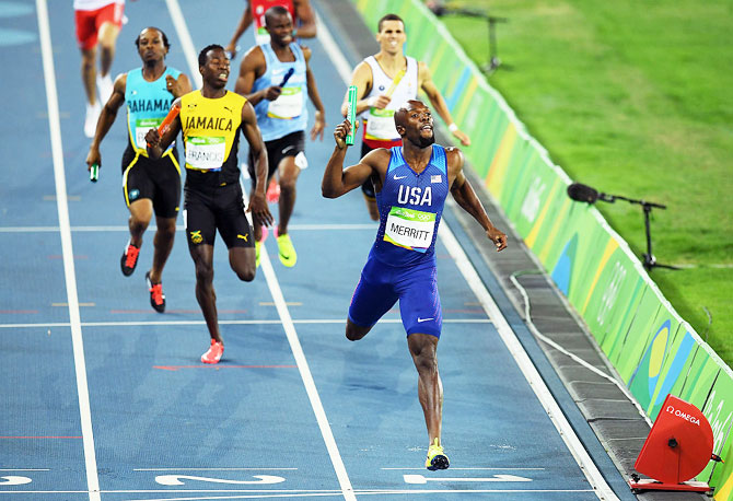 USA's Lashawn Merritt reacts after winning gold in the Men's 4 x 400 meter relay at the Rio 2016 Olympic Games at the Olympic Stadium in Rio de Janeiro on Sunday