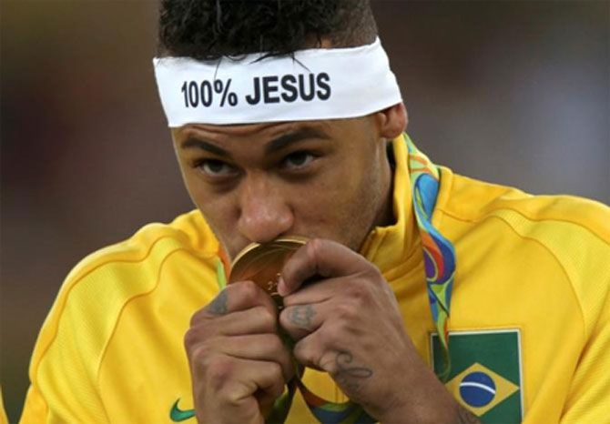Neymar kisses his gold medal following the Men's Football Final between Brazil and Germany at the Maracana Stadium on Day 15 of the Rio 2016 Olympic Games on August 20, 2016 in Rio de Janeiro, Brazil