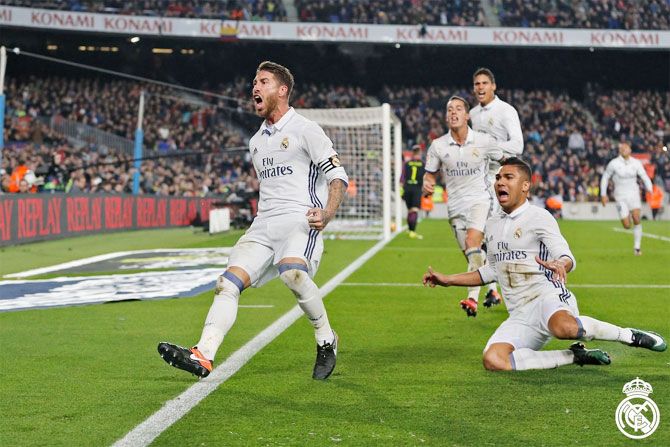 Real Madrid's Sergio is ecstatic after heading in the equaliser against FC Barcelona during their El Clasico La Liga match at the Camp Nou on Saturday