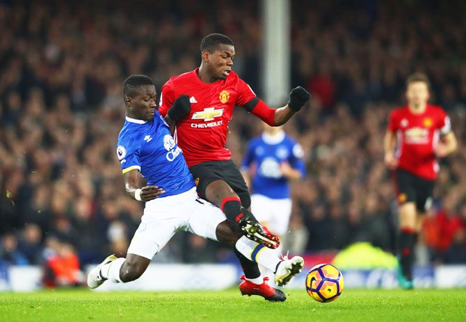 Manchester United's Paul Pogba (right) is challenged by Everton's Idrissa Gueye during their Premier League match at Goodison Park in Liverpool, on Sunday