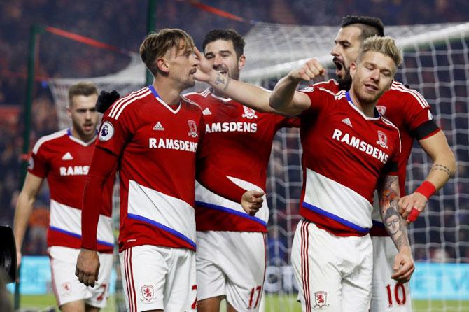 Middlesbrough's Gaston Ramirez celebrates with Adam Clayton, Alvaro Negredo and teammates after scoring against Hull City during their English Premier League match at The Riverside Stadium on Monday